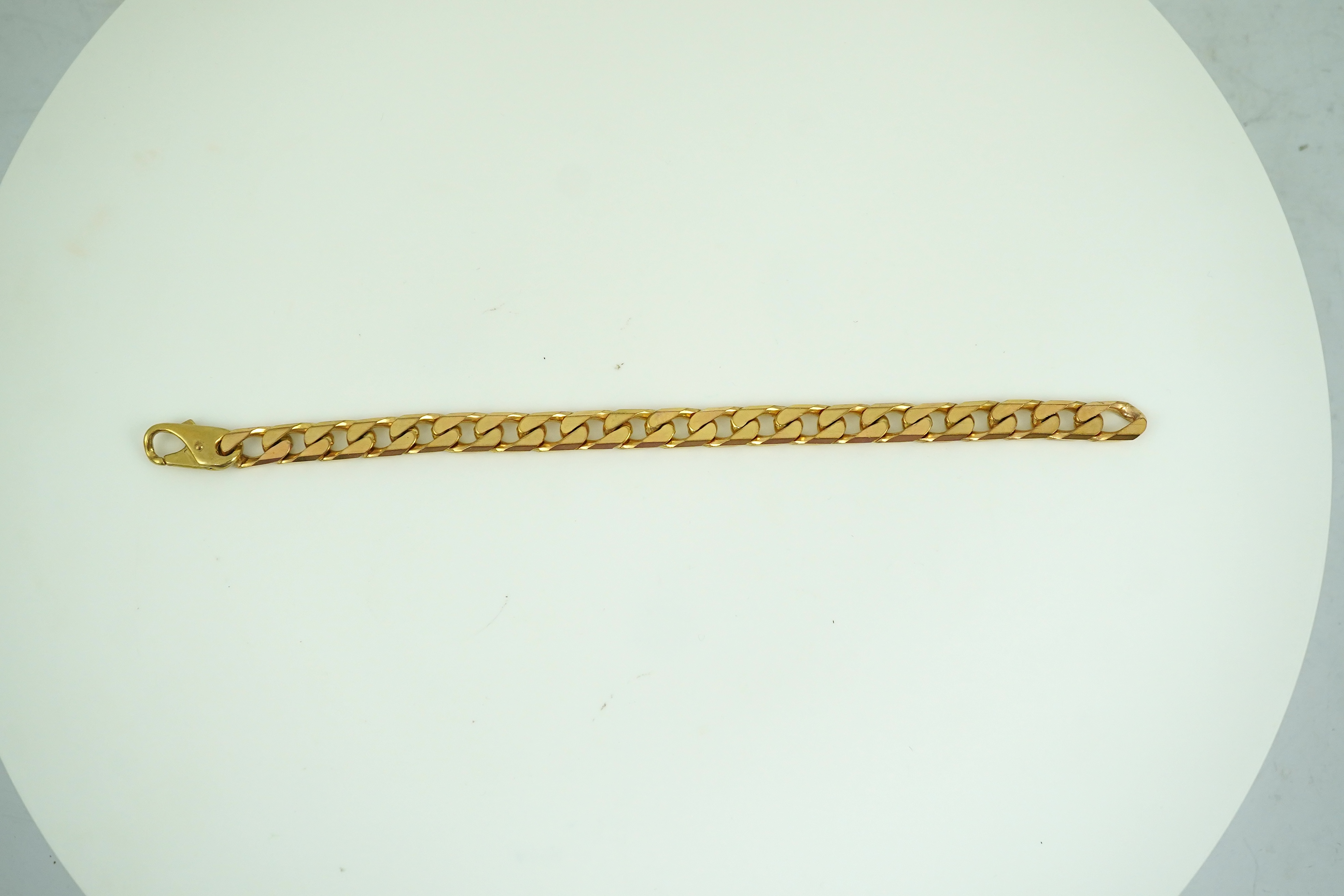 A 9ct gold bracelet, circa 1989